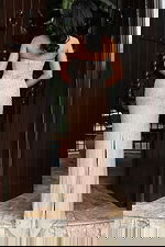 Jovani 48147 nude silver strapless fitted gown back view showing graduated crystal and pearl beading, zipper closure, and back slit