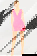 Strapless black mini dress with 3D floral hem detailing