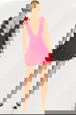 Back view of strapless black mini dress with zipper closure