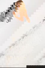 Tiered layered prom gown with sheer bodice