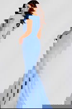 Off shoulder gown with sculpted draped neckline and mermaid skirt, designed in a sleek light blue fabric for a graceful formal look.