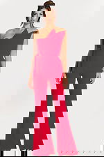 Front view of red one-shoulder structured jumpsuit with flared legs