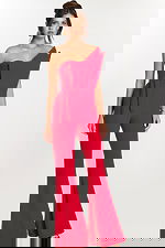 Angled front view of red asymmetric jumpsuit with folded neckline detail