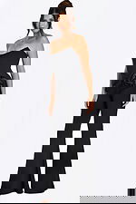 Strapless black jumpsuit with satin rosette detail at the hip