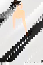 Back view of sleek strapless black flared-leg jumpsuit