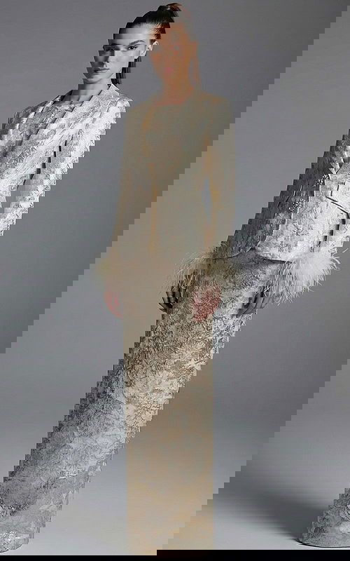 Front view of tailored brocade jacket with matching column skirt ensemble