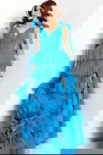 Romantic prom dress with statement bows and tiered layers