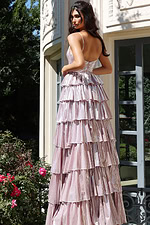 Shimmering layered metallic dress with open back and flowing silhouette