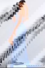 Light blue fitted gown with sheer rhinestone bodice