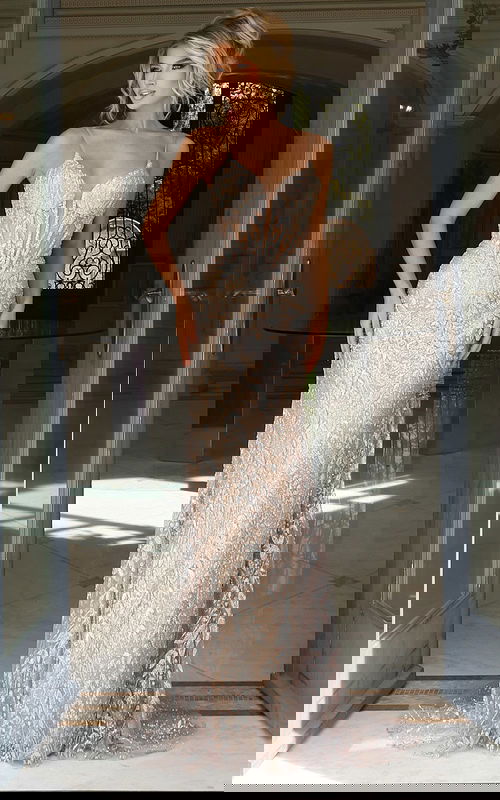 Beaded lace evening gown with spaghetti straps and deep V neckline