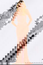 Fitted prom gown with high slit and sparkle