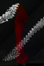 Strapless red sequin prom dress with sweetheart neckline and high slit