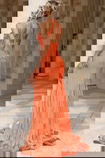 Elegant coral prom dress with backless design and side slit for formal events, galas, and red carpet occasions.