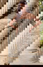 Back view of strapless lace dress with center slit and clean finish