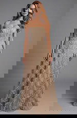 Strapless beaded gown with flowing silhouette and detailed texture