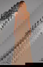 Back view of strapless gown with sheer fabric and intricate beadwork