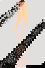 Metallic jacquard gown with beaded shoulder straps, fitted silhouette, and elegant leaf-patterned shimmer fabric.