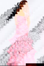 Back view of pink floral prom dress with layered train and fitted silhouette