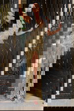 Glamorous gold prom gown with beaded bodice and sparkling fringe