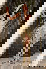 Shimmering gold sequin gown with layered fringe and fitted silhouette