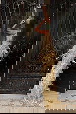 Gold beaded fringe prom dress with deep V neckline and high slit