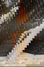 Glamorous gold high slit prom gown with sparkling beaded pattern