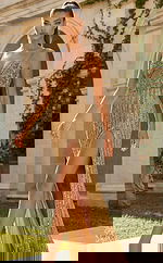 fitted embellished gown with lace up back, thin straps, and floor length silhouette