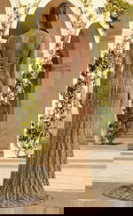 fitted embellished gown with cutout bodice, thin straps, and thigh high slit