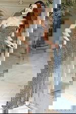 Front view of strapless rhinestone gown with fitted silhouette