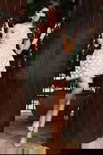 Jovani 48592 nude ivory strapless mini dress close up showing detailed scalloped beadwork with pearl and crystal fan motif on sheer nude base