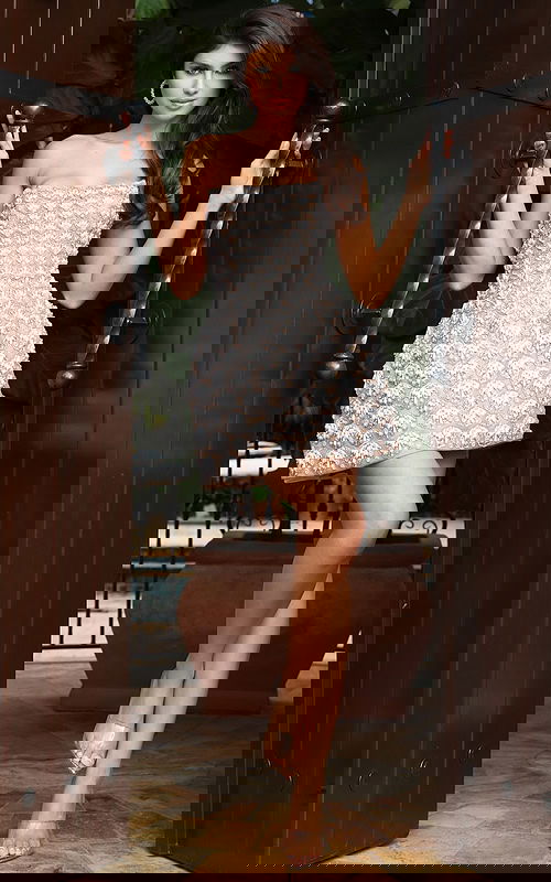 Jovani 48592 nude ivory strapless mini dress close up showing detailed scalloped beadwork with pearl and crystal fan motif on sheer nude base