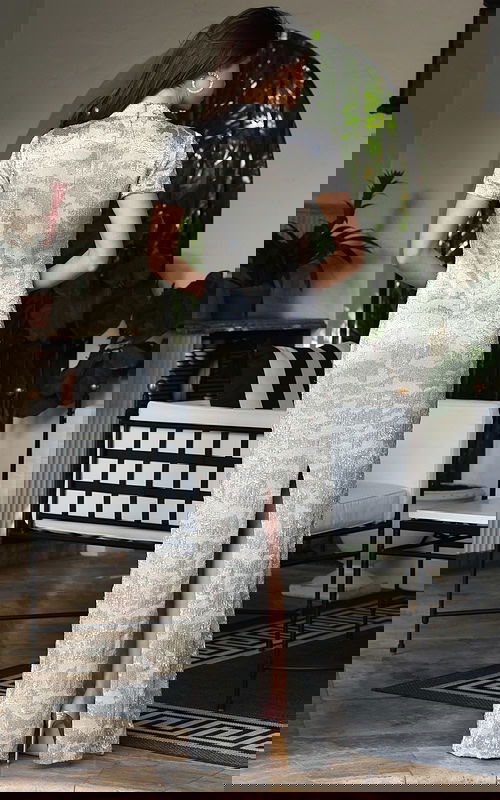 Jovani 48595 nude silver sequin fitted column gown back view with short sleeves, high collar neckline, zipper closure, and back slit