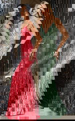 Two models in red and green sequin gowns with geometric patterns