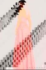 Strapless metallic jacquard gown with a fitted bodice and full A-line skirt accented by gold foil detailing.