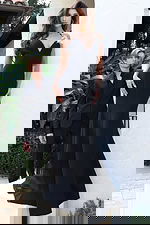 Jovani 48663 black deep V neck fitted mermaid gown with metallic floral embellished shoulder strap detail and sweep train