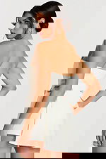 Angled back view showing zipper closure and side detail of the belt