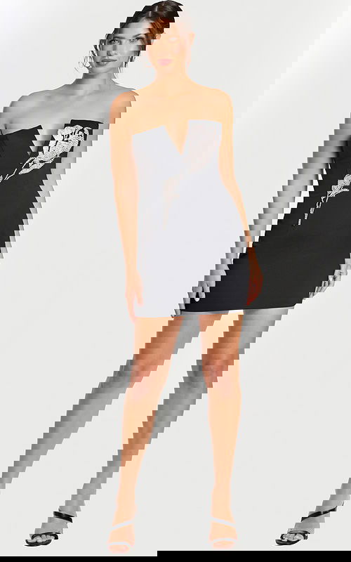 Strapless black mini dress with deep V-neck and rhinestone rose applique