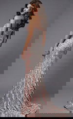 Strapless fitted gown featuring embroidered leaf detailing and subtle train