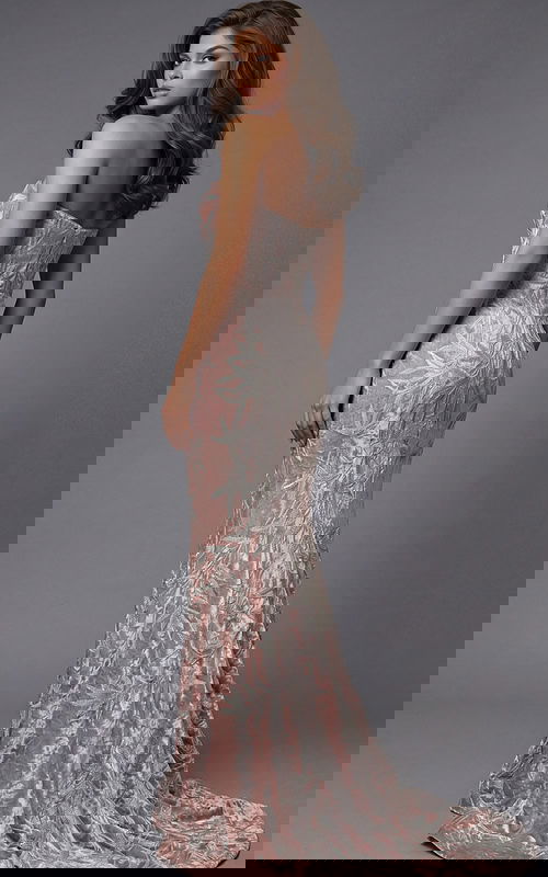 Strapless fitted gown featuring embroidered leaf detailing and subtle train