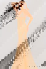 Sleek backless gold gown with spaghetti straps