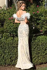 Full-length embellished gown with intricate silver beadwork design