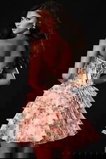 Strapless floral print dress featuring a fitted bodice and flouncy tiers