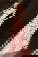 Flowing ruffle gown with sweetheart neckline and floral print