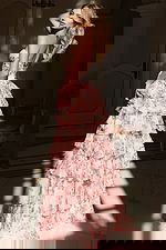 Romantic strapless dress with lace-up back and tiered floral layers