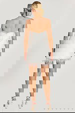 back view of ivory fitted dress with fringe hemline 48787