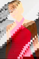 Close-up of red halter-style neckline and pleated waist detailing