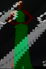 Elegant green fitted gown featuring high neckline and open back