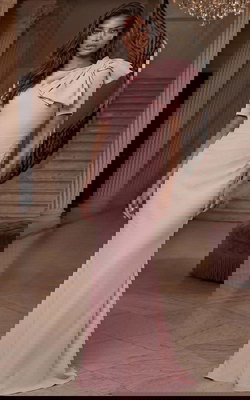 Short sleeve evening gown with statement bow shoulder detail