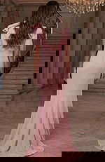 Back view of fitted floor length gown with clean silhouette