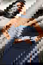 Navy strapless gown with embellished neckline and cape